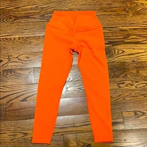 Orange airlift Alo leggings